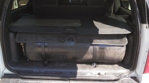 Two 7.5 gge CNG tanks mounted in cargo area of Chevy Suburban